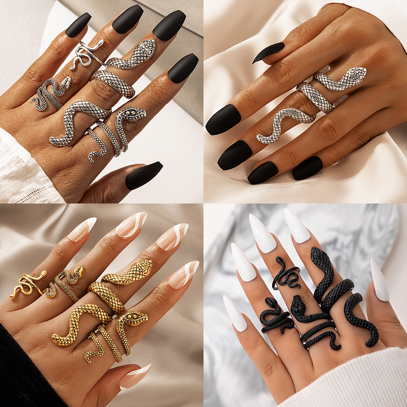 فاسق ثعبان على شكل المفصل خوات - مراجعة Vintage Punk Knuckle Rings Set وسعره